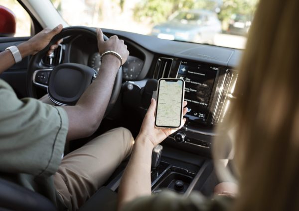 close-up-friends-with-phone-car